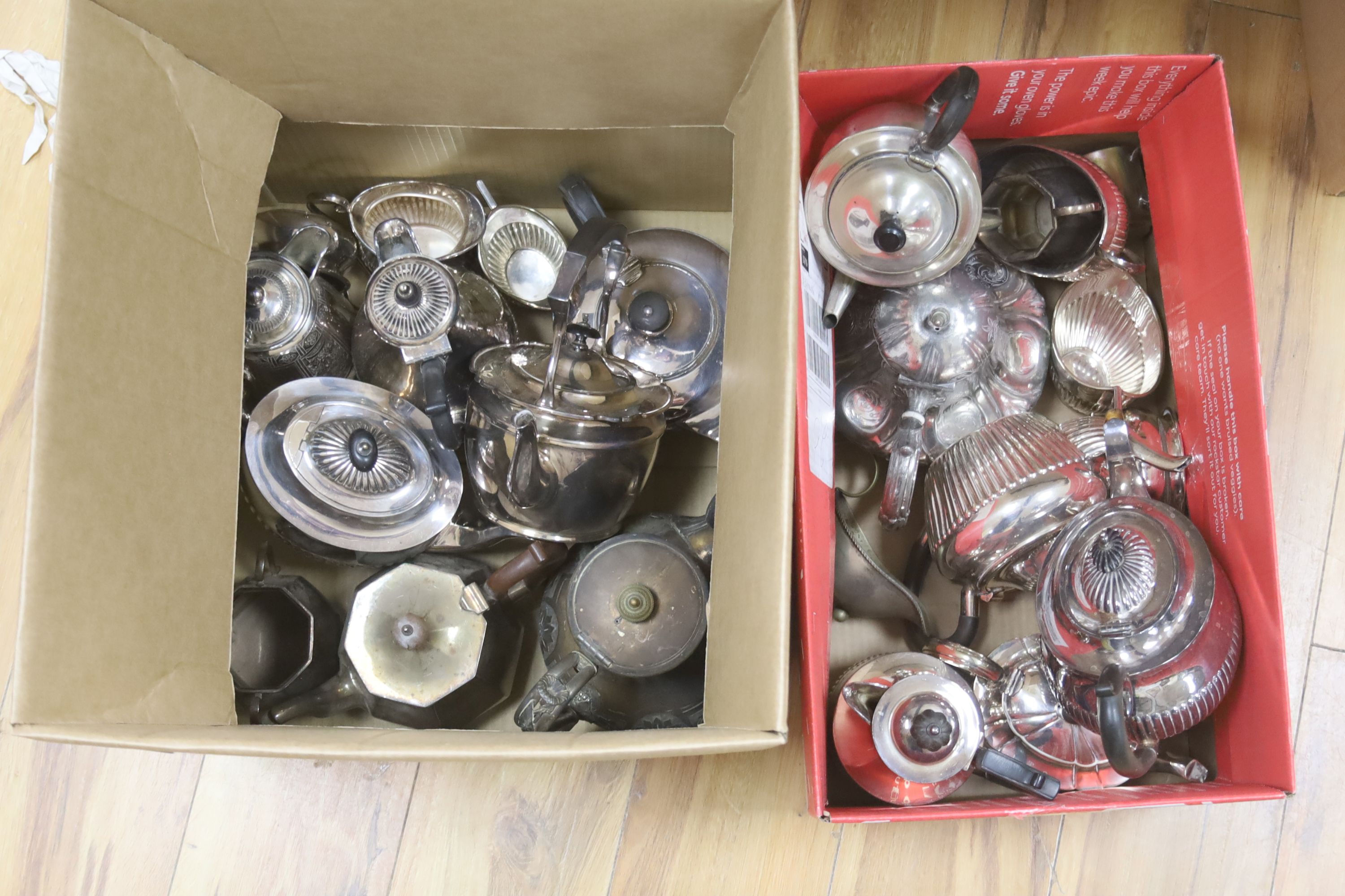 A quantity of assorted plated tea ware including teapots, tea kettle, coffee pot, etc.